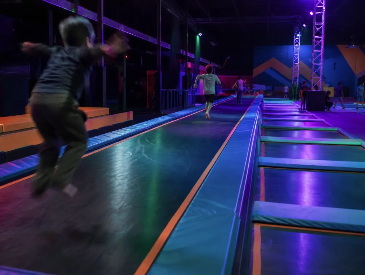 A trampoline park of the kind Pinpoint signs